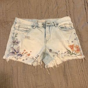 Chelsea and Violet embroidered jean shorts.